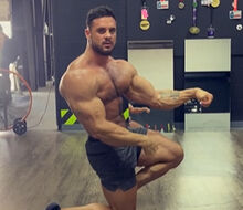 Logan Franklin practices posing for the Classic Physique Olympia 2022 competition