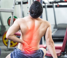 We'll give you eight tips to help you combat lower back pain!