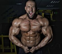 Extremely motivated Pavel Beran at shoulder and triceps training